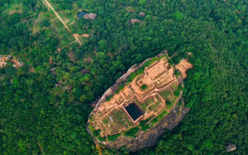 Aerial view of Sigiriya rock at misty morning, Sri Lanka. Drone footage